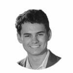 Black and white portrait of a smiling young man in a suit, isolated on white background.