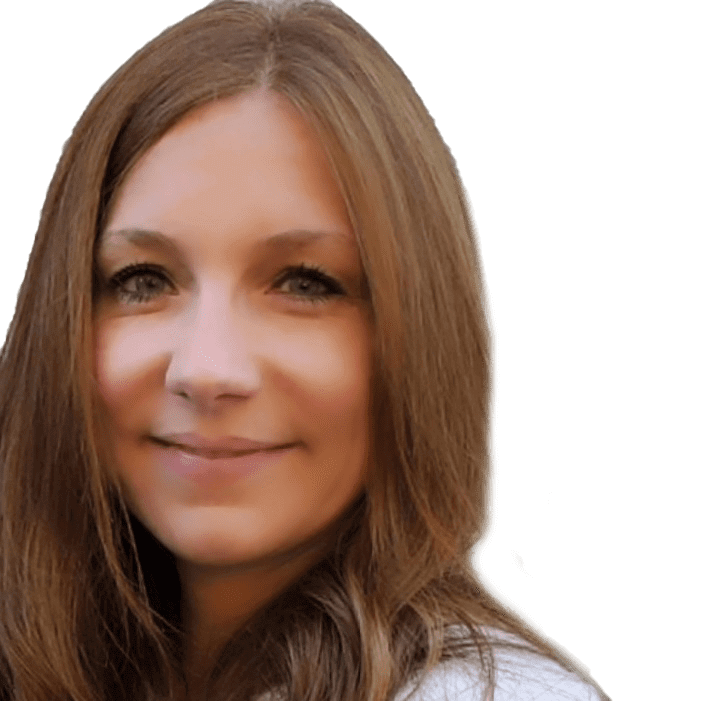 Brunette woman smiling, close-up portrait, light background.