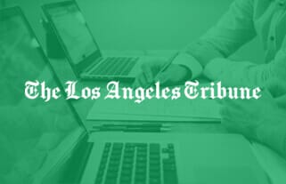 The Los Angeles Tribune logo over a business meeting with laptops and notepads, SCALE Press coverage.