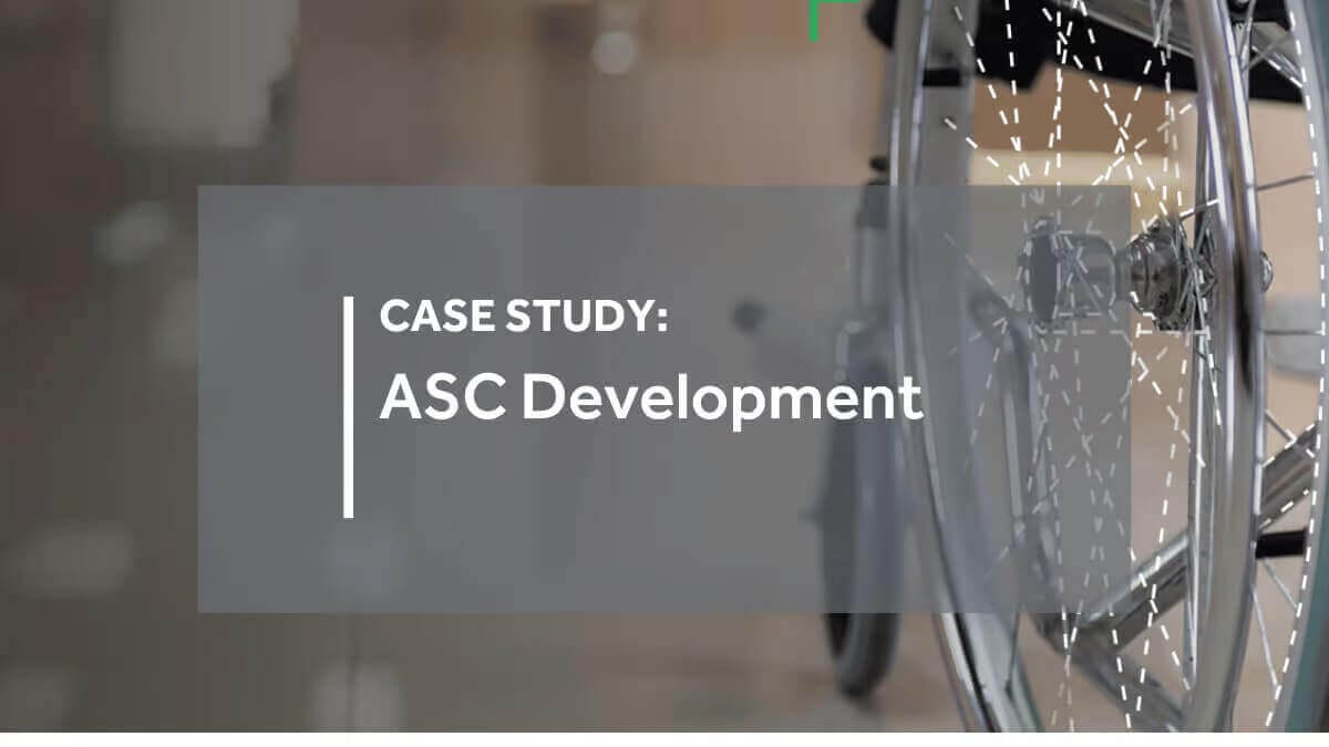 Case study on ASC Development with wheelchair wheel in background, highlighting healthcare innovation and accessibility.